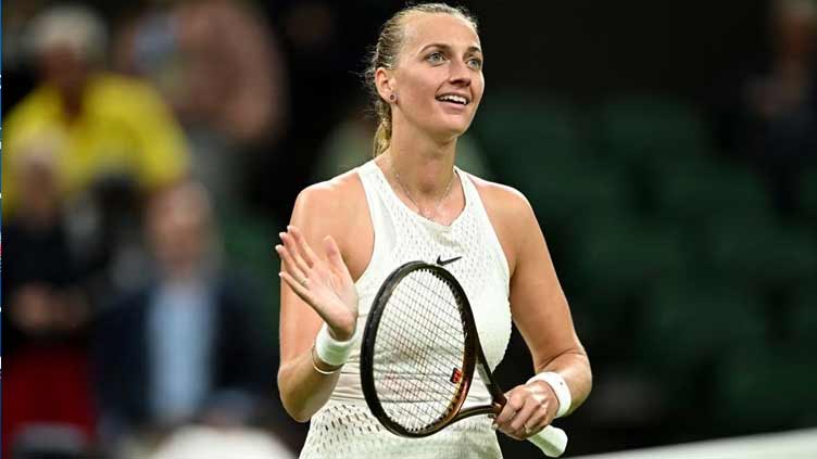 Experienced Kvitova beats Paolini in three sets