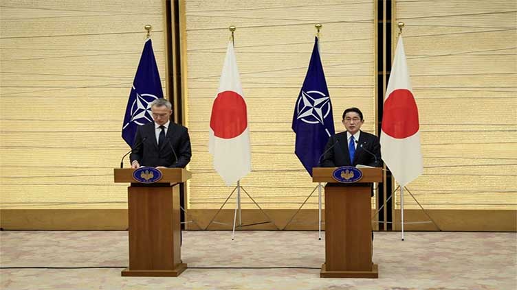 Japanese PM heads to NATO to warn of East Asia risks