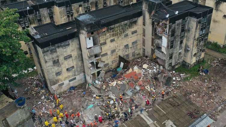 At least eight dead after apartment building crumbles in Brazil