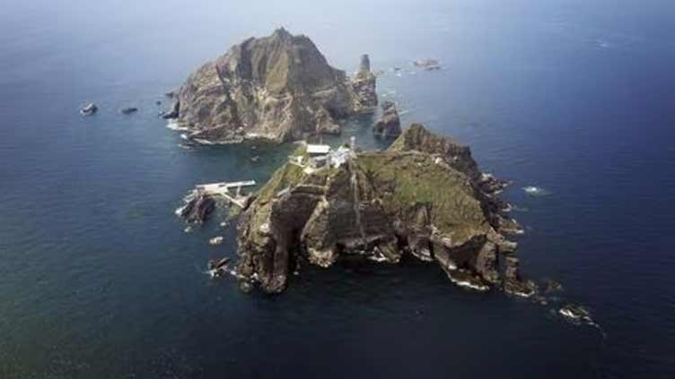 Japan protests to South Korea over military drills on disputed islands