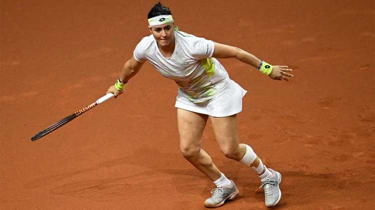 Jabeur battles back to beat Andreescu