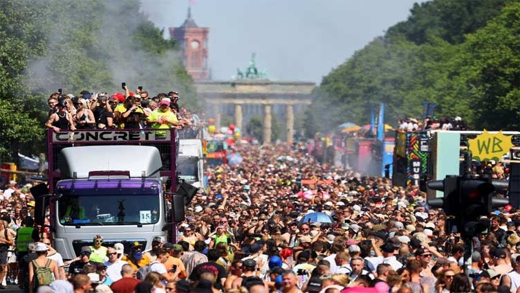Ravers dance through Berlin heat at techno parade