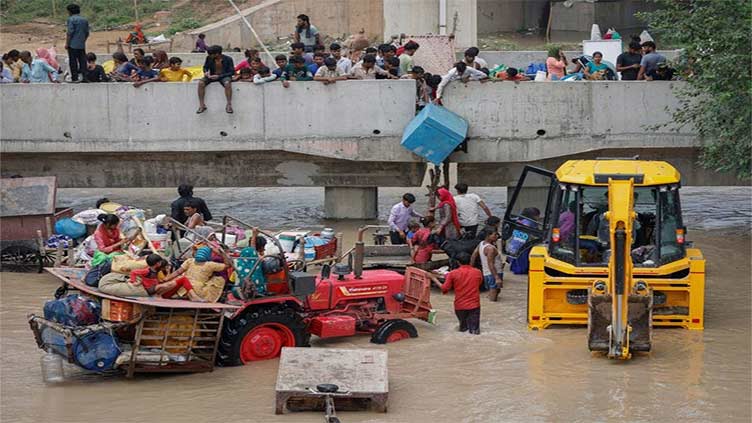 New Delhi evacuates hundreds over risk of flooding after record rainfall