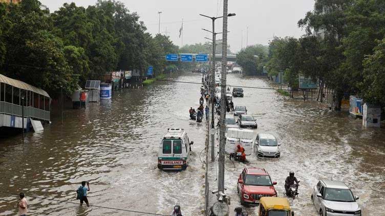 New Delhi races to open jammed flood gates as river surge halts India's capital