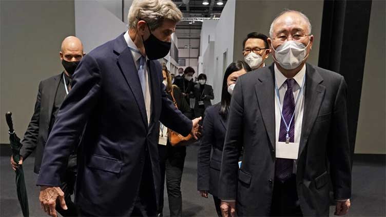 US envoy Kerry arrives in China to restart climate talks