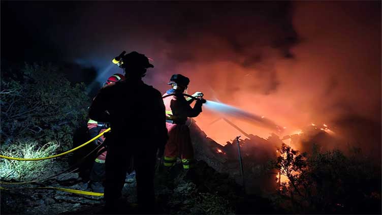 Better weather conditions help slow down La Palma wildfire in Spain's Canary Islands