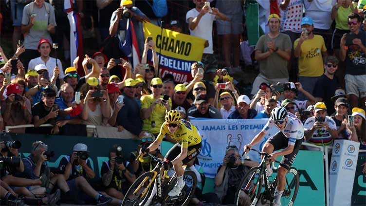 Vingegaard retains Tour lead as Poels wins in Alps