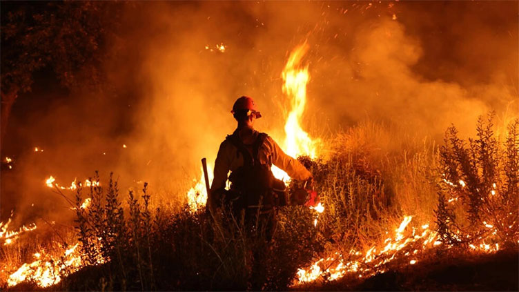 Dangerous heatwaves strike globe as wildfires rage