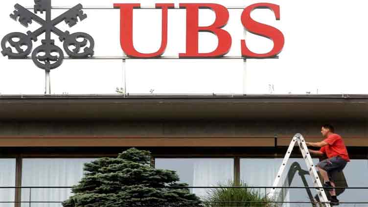 Thousands of jobs lost but UBS investors warm to Credit Suisse deal