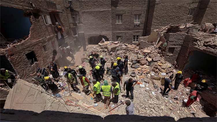 At least 13 killed in building collapse in Cairo