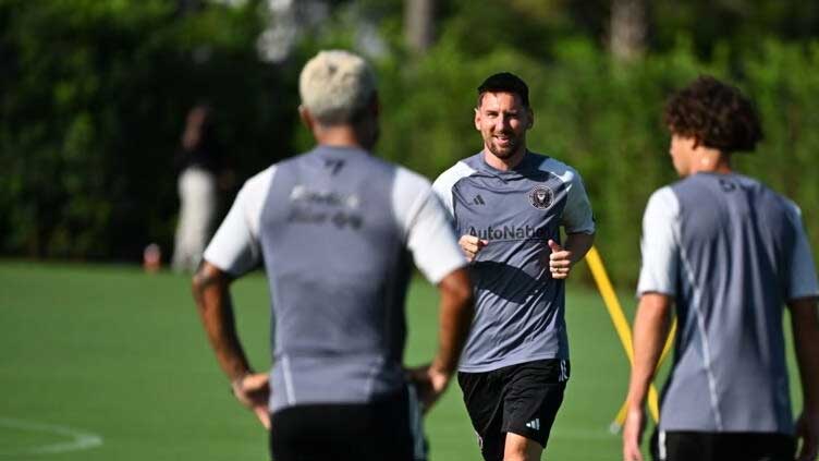 Messi gets down to business in Florida heat