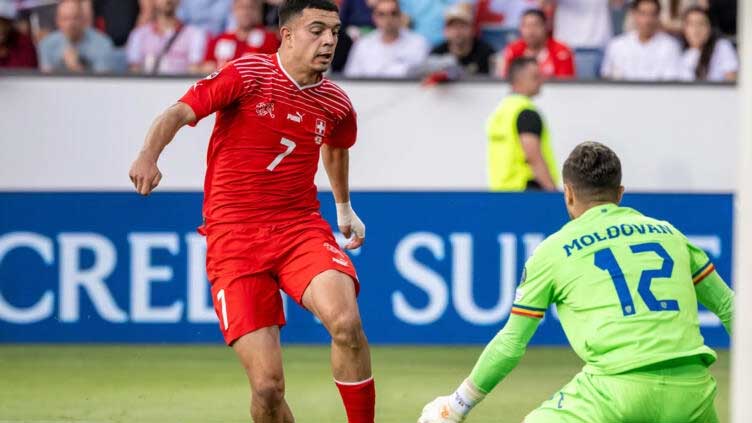 Burnley sign Swiss striker Amdouni from Basel