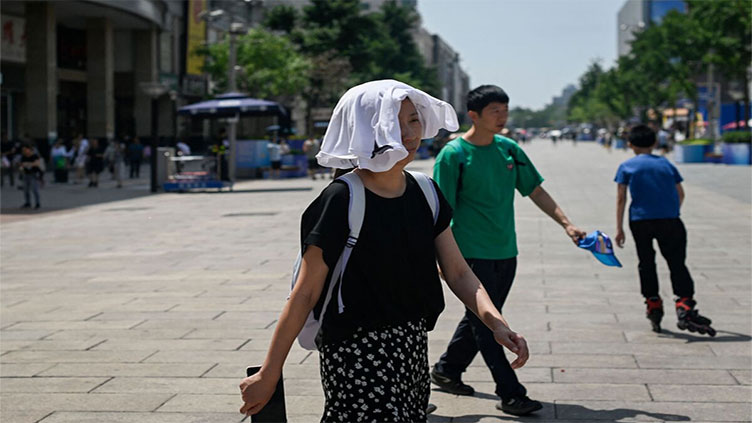 Europe battles heat and fires; sweltering temperatures scorch China, US