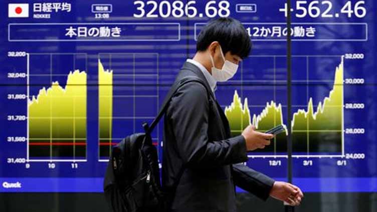 Asian shares fall after US tech falters, dollar and yields hold gains