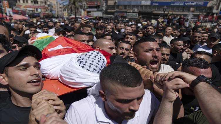 Israeli army fire kills Palestinian man during clashes at West Bank shrine