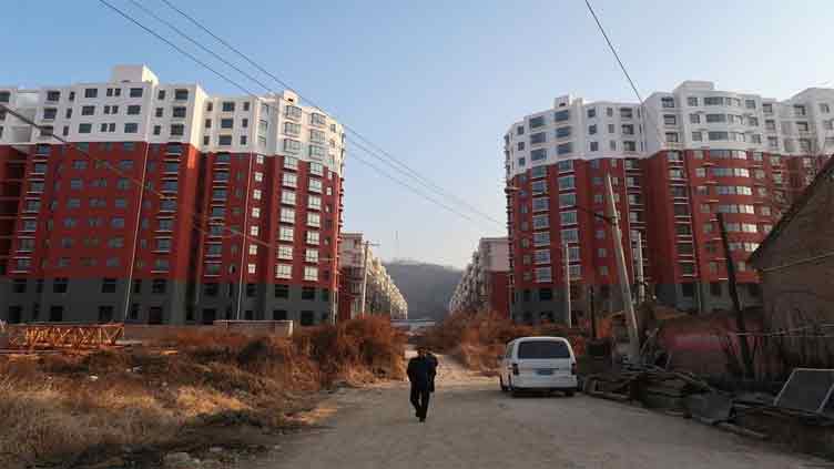 China to boost demand by pushing urban development