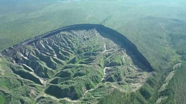 World's biggest permafrost crater in Russia's Far East thaws as planet warms