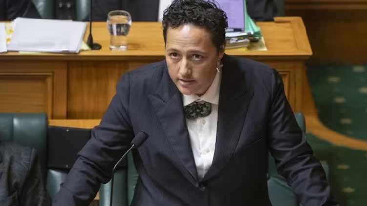 New Zealand justice minister quits after being charged following car crash