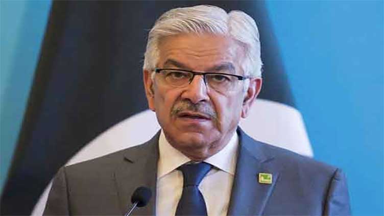 Asif says PTI chief using workers as shield to avoid facing courts
