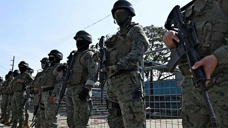 Ecuador forces wrest back control of prison as riot death toll climbs