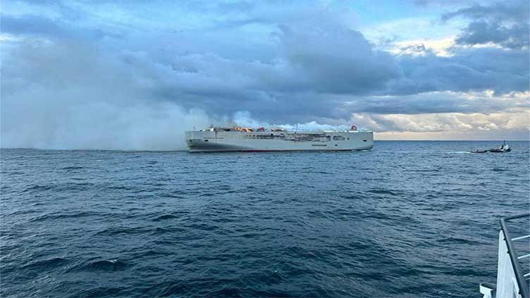 Ship carrying 3,000 cars burns off Dutch coast, one dead