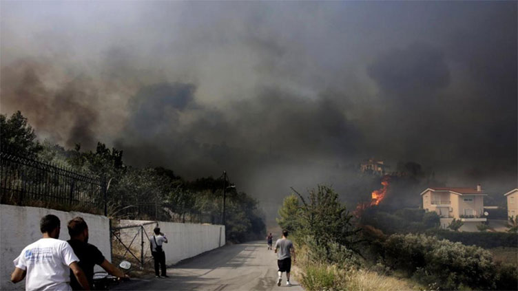 Greece wildfires erupt on mainland, killing two people