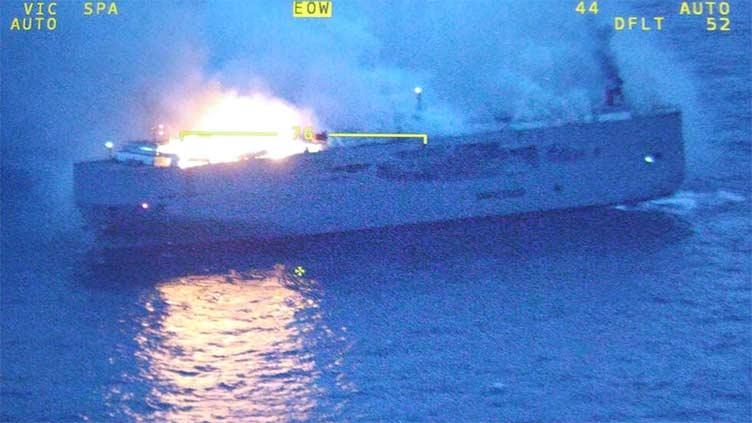 Dutch race to put out blaze on car ship