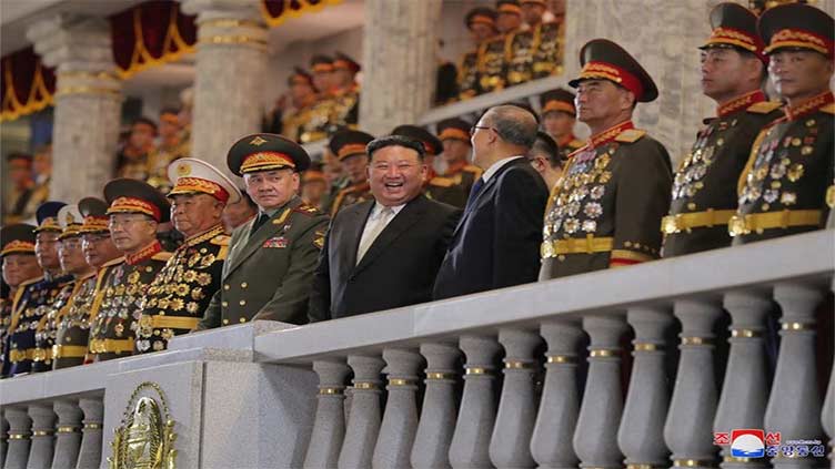 Russian, Chinese officials join Kim Jong Un at North Korea military parade