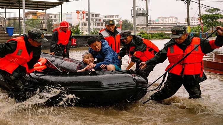 Northern China faces Doksuri floods as south mops up from storm