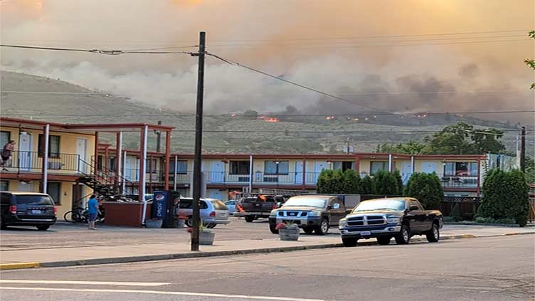 Evacuation order issued for Canadian town as wildfire crosses over from US