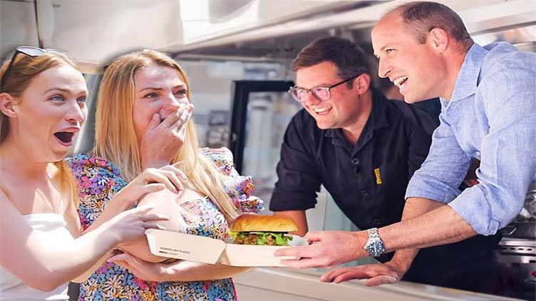 Burger king: Prince William serves up food to surprised diners