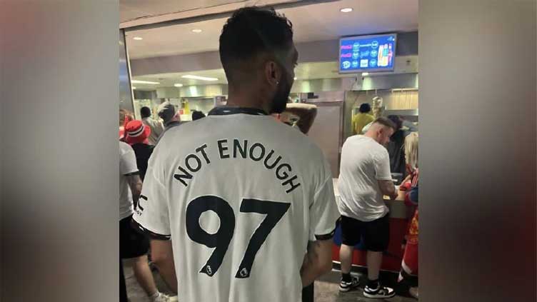 Fan arrested for '97' slogan on shirt