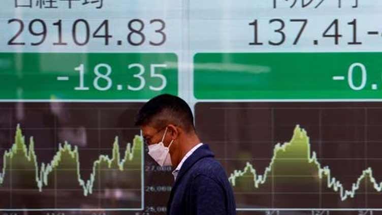 Asian shares extend global rally; oil prices jump on Saudi cuts