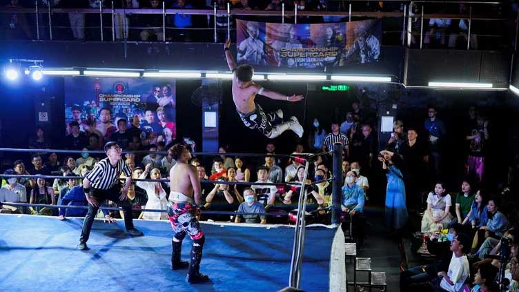 Pro wrestlers return to China as global bouts resume after pandemic