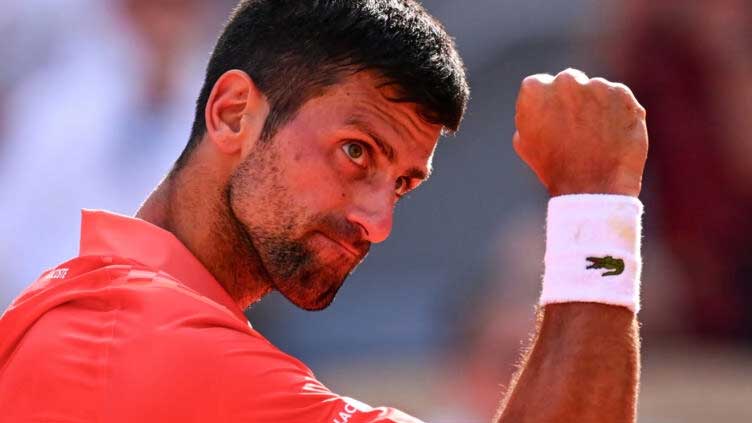 Djokovic beats cramping Alcaraz to reach French Open final