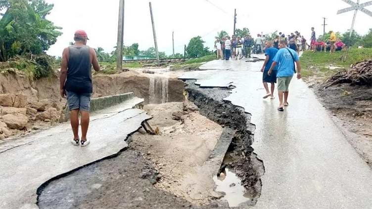 One dead and thousands evacuated as floods batter Cuba