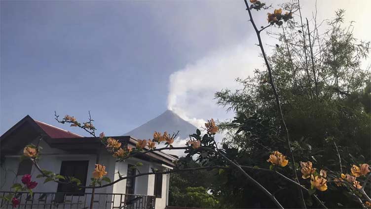 Thousands evacuated as Philippine volcano spews ash, rocks