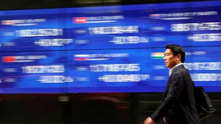 Asia shares near month high ahead of central bank meetings