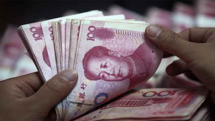 China's yuan strikes 6-month low after central bank cuts interest rate