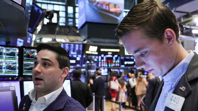 Stocks jump, dollar eases as inflation data suggests Fed pause