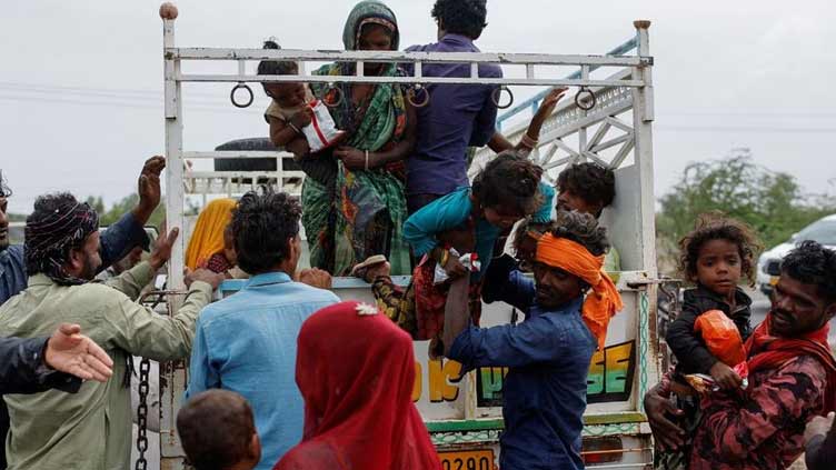 Fast approaching cyclone forces evacuation of 75,000 people on India's west coast