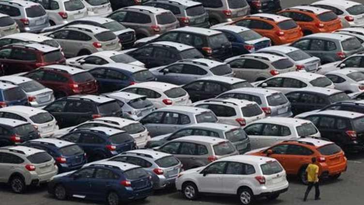 Japan exports grow unexpectedly on solid car sales, global demand still uneven