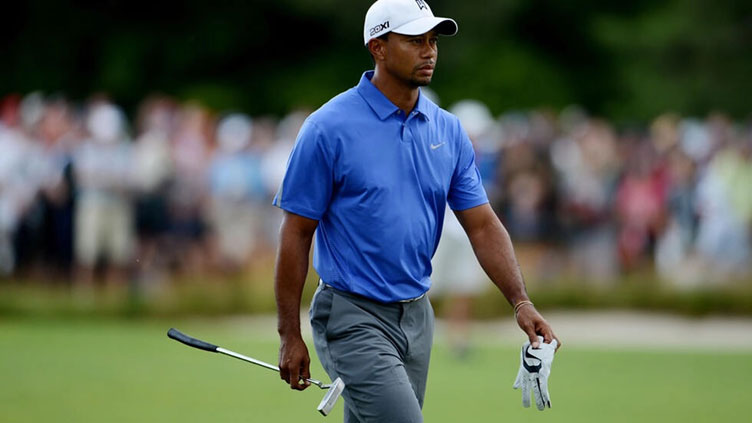 Injured Woods to miss British Open