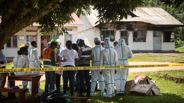 Militants linked to Islamic State kill 25 in attack on Ugandan school - police