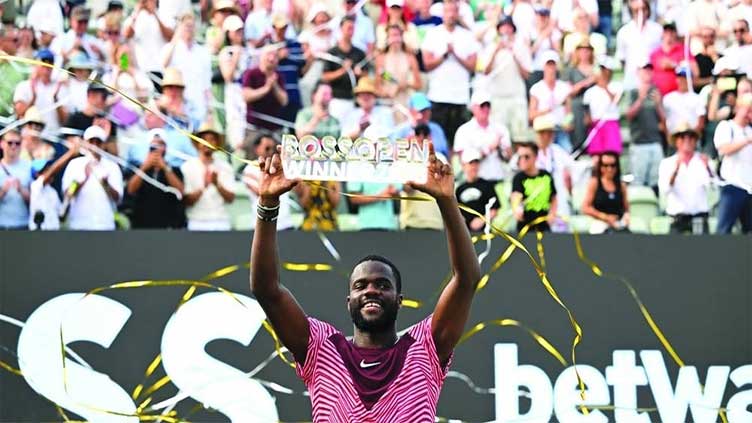 Tiafoe claims maiden grass court title and moves into top 10