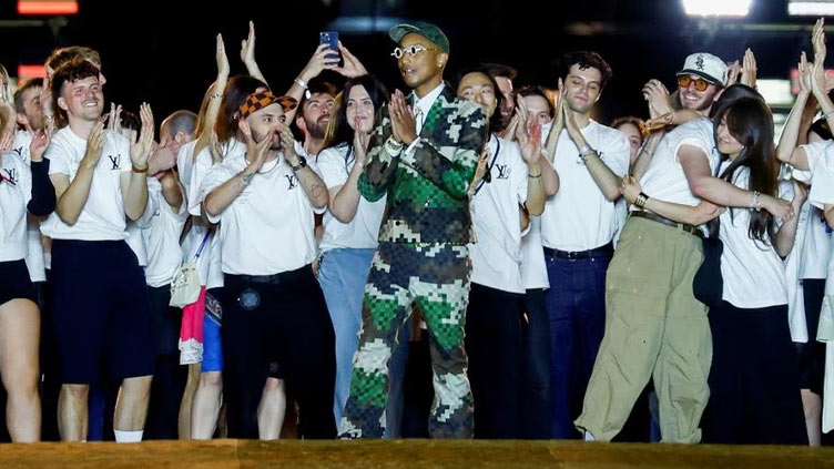 Pharrell Williams stages Louis Vuitton debut on Pont Neuf, 1450 AM 99.7 FM  WHTC