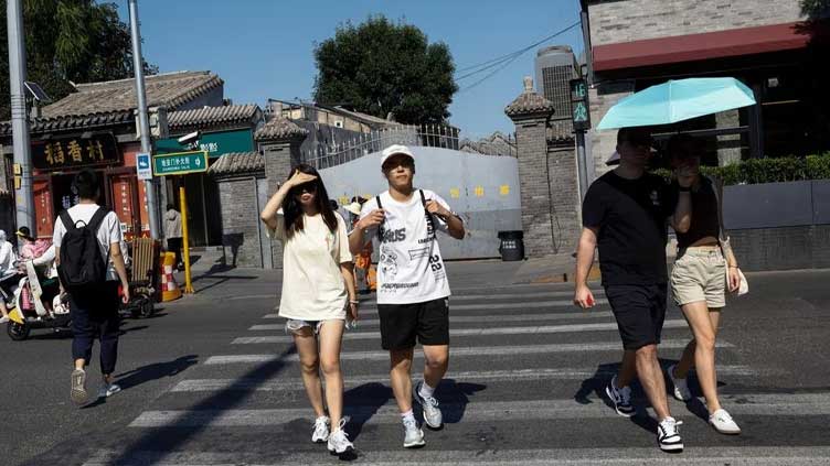 Beijing temperature soars above 40 Celsius, shatters June record
