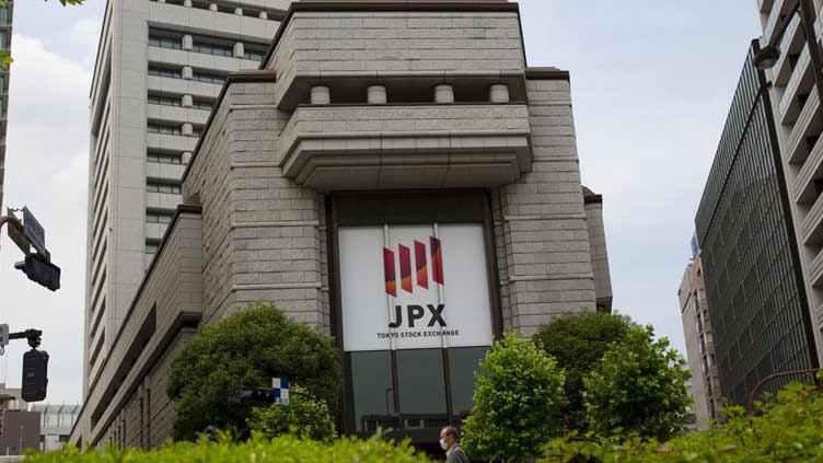 Asia stocks slide as growth outlook darkens