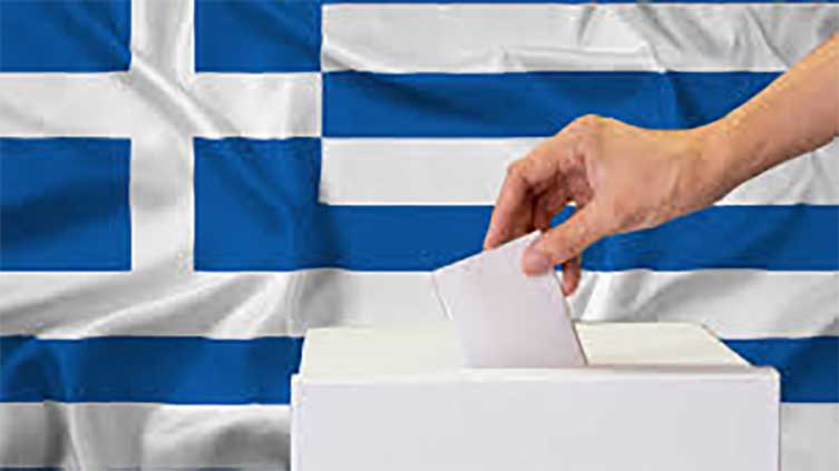 Greeks vote in repeat election, likely to return conservatives to office