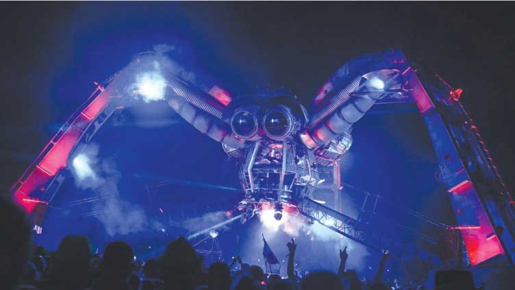 At Glastonbury, a giant spider powered by renewable energy
